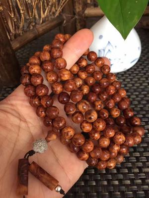 崖柏瘤疤手串:經(jīng)典紅油料,懸崖上的珍寶